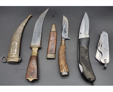 A British military folding pocket knife, by J H Thompson, stamped '1954'; together with an Othello Solingen stag handled knif
