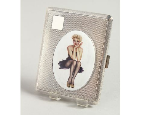 AN ENGINE TURNED CIGARETTE CASE, with an enamel oval of a glamour model in a black dress. Birmingham 1956.