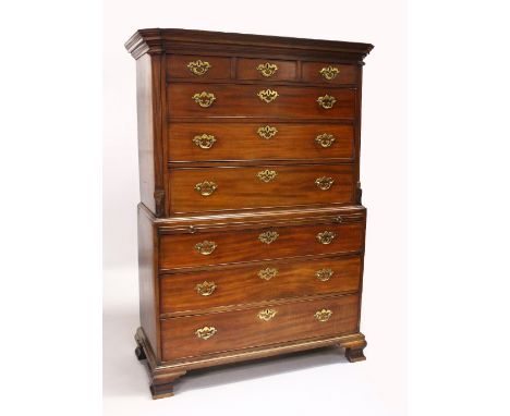 A GEORGE III MAHOGANY CHEST ON CHEST, with moulded cornice, three small drawers, three graduated long drawers flanked by flut