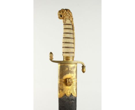 A 19TH CENTURY ROYAL NAVAL OFFICERS DIRK, with lion head pommel, wire bound shagreen grip, acorn quillons, the broad blade et