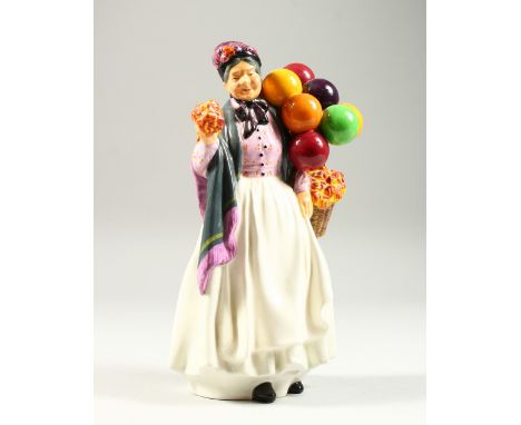 A ROYAL DOULTON FIGURE 'BIDDY PENNY FARTHING', No. HN1843, Designed by L. Harradine, First Issued 1938. 9ins high.