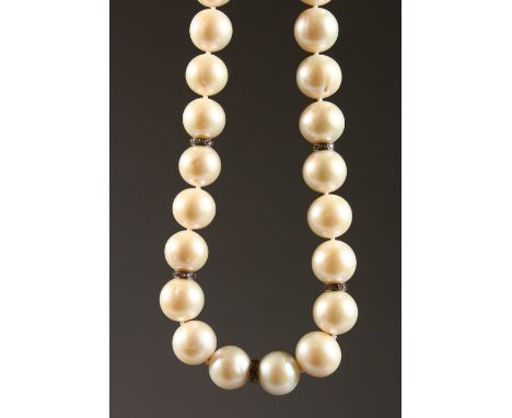 A PEARL NECKLACE, interspersed with small diamonds. 42cms long.