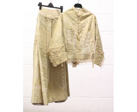 EDWARDIAN PALE GREEN SILK SKIRT AND WAISTED JACKET, with handmade lace trims and fishtail back to the jacket.