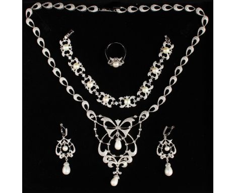 A SILVER .925 DIAMOND AND PEARL PASTE NECKLACE, EARRINGS AND RING.