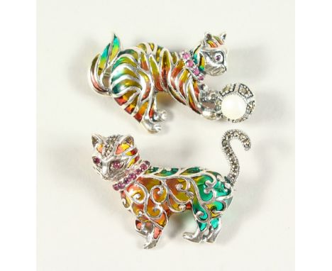 TWO NOVELTY SILVER AND ENAMEL CAT BROOCHES with rubies and pearls.