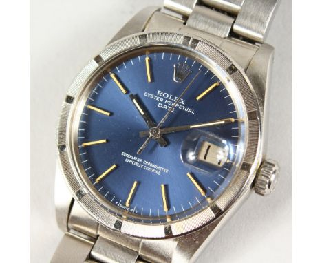 A GENTLEMAN'S ROLEX OYSTER PERPETUAL DATE WRISTWATCH, superlative chronometer, officially certified, with blue dial, No. 557 