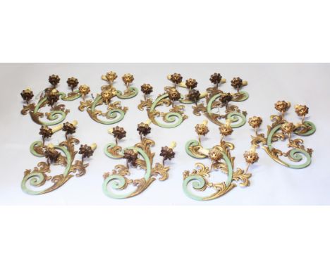A SET OF EIGHT UNUSUAL FOUR-LIGHT WALL LIGHTS, naturalistic form, green painted and gilded decoration. 60cms high.