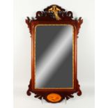 A GEORGIAN STYLE MAHOGANY FRETWORK FRAMED MIRROR, with ho-ho bird crest and shell inlay. 92cms