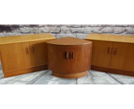 THREE G-PLAN TEAK LOW CUPBOARDS, including a pair of side cupboards 81cm wide, and a corner cupboards 64cms wide (3)The corne