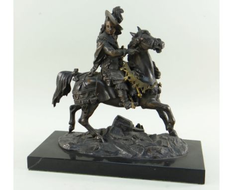 LATE 19TH CENTURY FRENCH PARCEL GILT BRONZE CAVALIER, on horseback failing to destra, on rectangular black marble base, 27cms
