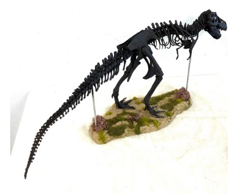 Resin 120 scale T Rex skeleton, approximate measurements: Height 10 inches, Length 26 inches 