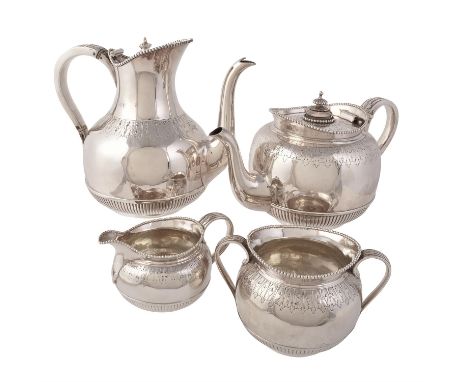 Y A matched Victorian silver four piece baluster tea and coffee service, the three piece by Elkington & Co., London 1880, the