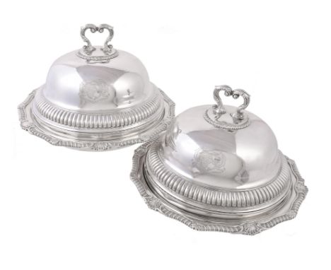 A pair of late George III silver shaped circular vegetable dishes and covers by William Stroud, London 1812, the covers unmar