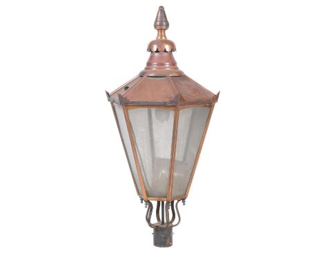 A Victorian copper lantern, circa 1900, of tapered hexagonal section with domed top, formerly crestings for the lamp posts, t