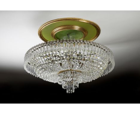 A glass and gilt metal mounted ceiling light, late 20th century, the circular frame hung with beaded chains and tiers of face