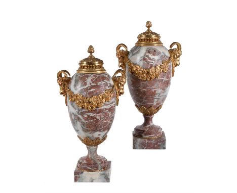 A pair of French Brocatelle marble and gilt metal mounted urns in Louis XVI style, late 19th/early 20th century, each festoon