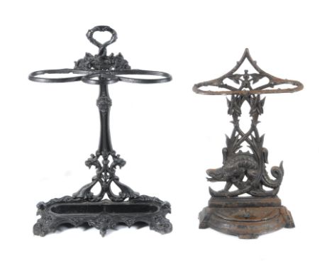 A Victorian black painted cast iron stick stand in the manner of Coalbrookdale, cast with openwork scrolling foliage overall,