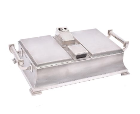 An Art Deco silver twin compartment rectangular cigar and cigarette box by Padgett & Braham Ltd., London 1940, the engine tur