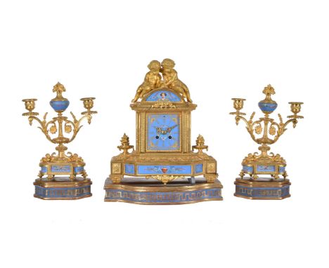 A French Sevres style porcelain and gilt metal mounted clock garniture Japy Frères, second half 19th century, the eight-day b