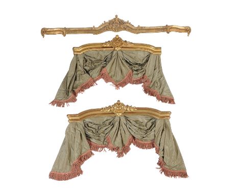 A large Victorian and later giltwood pelmet, with scrolling ornament above moulded frame, approximately 263 cms wide, 28cms h