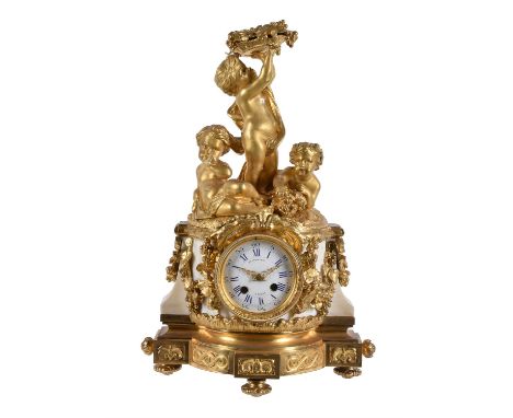 A late 19th century ormolu and white marble mantel clock, Raingo Freres, Paris, with eight-day bell striking movement with ou