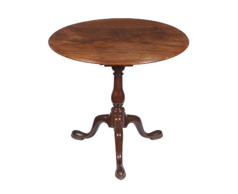 A George III mahogany tripod table, circa 1780, circular top on birdcage support, bulbous stem and pad feet, 76cms diameter, 