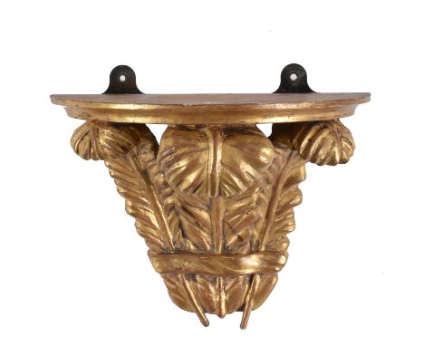 A carved giltwood wall bracket, the semi-elliptical platform supported on Prince of Wales feathers, 21cm highCondition Report