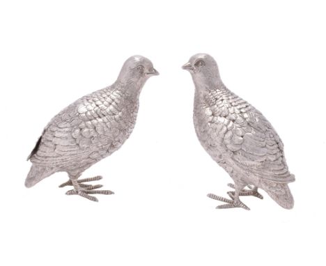 Asprey, a pair of silver models of grouse by Asprey plc, London 1987, 11cm (4 1/4in) high and slightly smaller, 553g (17.8 oz