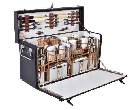 A motor car travelling picnic set for four, 1930s, the complete fitments with chromium plated mounts, including: cutlery, two