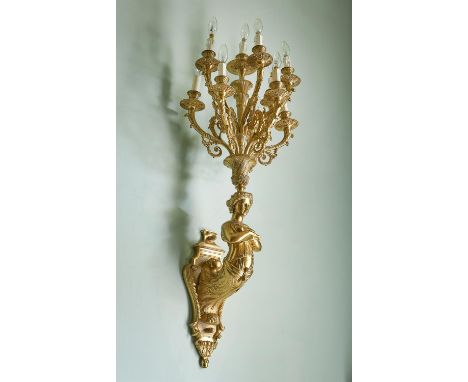 A pair of substantial French gilt-metal ten light wall appliques in Empire style, 20th century, the foliate cast sconces and 
