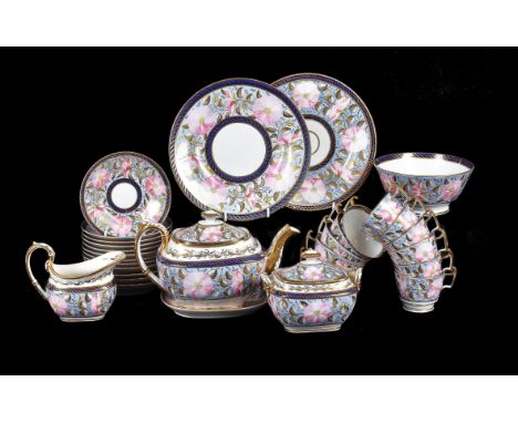 A John Rose Coalport 'London' shape part tea service, circa 1812, painted with a band of pink convolvulus and gilt foliage re