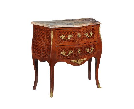 A walnut, marquetry inlaid, and gilt metal mounted commode in the Louis XV style, early 20th century, with a shaped marble to