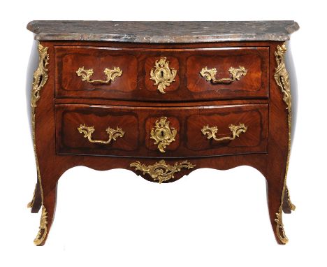 Y A French kingwood, gilt metal mounted, and marble topped commode, mid-19th century and later, of bombe outline, the shaped 