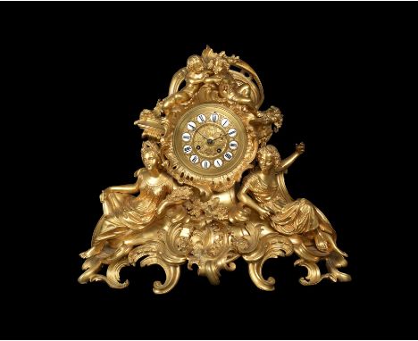 A late 19th century French ormolu clock Graux Marly Paris, the case richly decorated with seated female figures symbolic of f