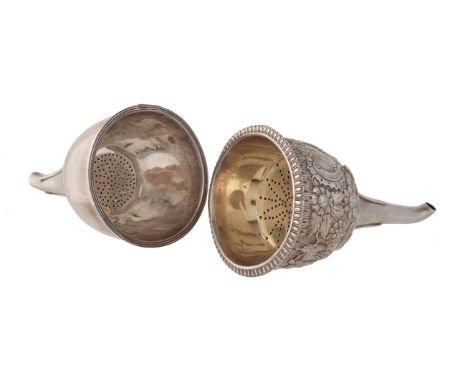A George IV Irish silver wine funnel by Edward Crofton, Dublin 1827, the strainer with an everted ovolo rim, embossed with fl