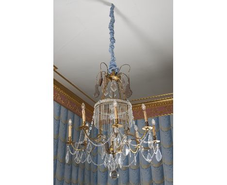 A Continental gilt metal and cut and moulded glass eight light chandelier, probably Italian, last quarter 19th century, the o