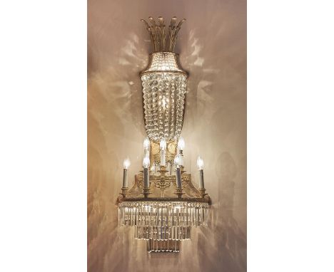 A set of six French gilt metal and cut glass seven light wall lights, 19th Century and later, each of large proportions and w