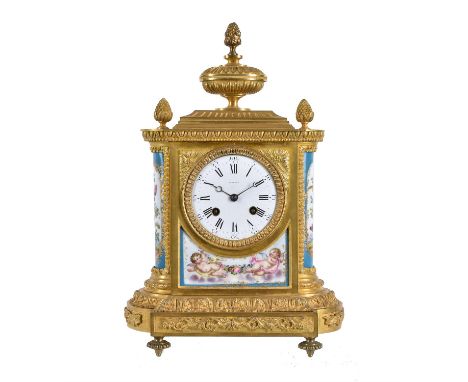 A French Sevres style porcelain and gilt metal mounted mantel clock, second half 19th century, with eight day bell striking m