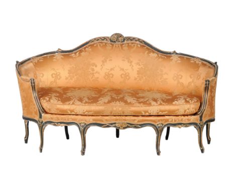 A Louis XV carved giltwood and painted sofa, circa 1760/1780, upholstered in orange silk damask and raised on cabriole legs. 