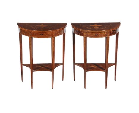 A pair of Edwardian mahogany, crossbanded and marquetry occasional tables, circa 1905, of semi-elliptical outline, each inlai