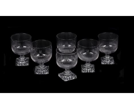 A set of six rummers, circa 1820, the round bowls engraved with initial M above a fluted lower section and supported on a 'le