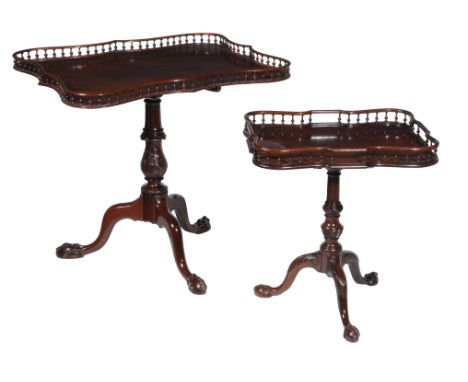 A mahogany tripod table in George III style, with shaped rectangular gallery tilt-top above a carved baluster stem and tripod