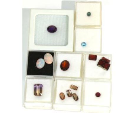 A Quantity of Loose Gem Stones, including an alexandrite, an amethyst, an ametrine, a ruby, a citrine, a blue topaz, four gar