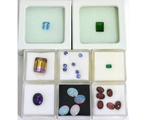 A Quantity of Loose Gemstones, including an ametrine, an aquamarine, a chrome diopside, an amethyst, an emerald, four opals, 