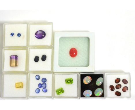 A Quantity of Loose Gemstones, including an amethyst, an ametrine, a heliodor, a cabochon coral, two peridots, four opals, si