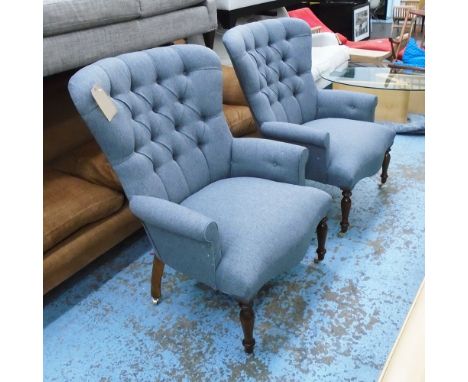 ARMCHAIRS, a pair, button back in grey herringbone fabric on turned castor supports, 84cm W. (2)
