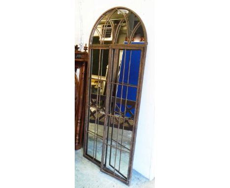ARCHITECTURAL STYLE GARDEN MIRRORS, a pair, metal framed with an arched top and opening grill, approx 78cm W x 180cm H. (2)