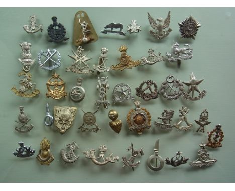 Forty good original, mainly post-independence Indian/Pakistani Army badges, brought back by Saint John Mayor Sam Davis who wa