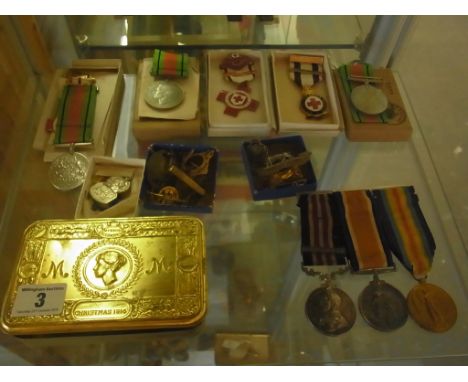 An interesting local family group of Medals with a World War I trio George V military medal for bravery in the field, War Med