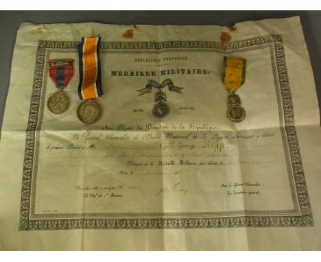 A First World War 1914-18 War Medal, a For Faithful Service Medal and a Medaille Militaire for Valeur Discipline awarded to C